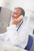 Smiling doctor calling