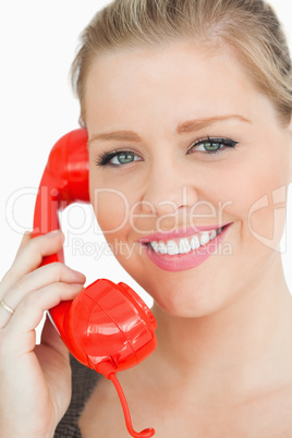 Woman smiling at a phone