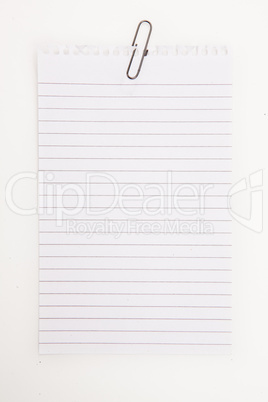 Blank page with grey paperclip