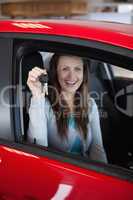 Woman holding car keys