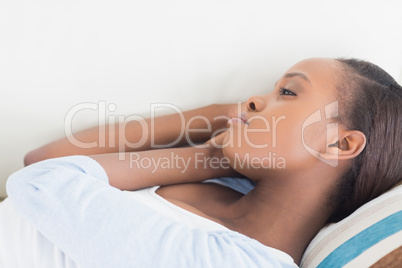 Black woman lying on back