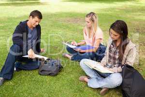 Three students studying together