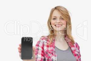 Woman showing a mobile phone