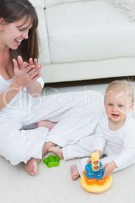 Baby sitting on the floor while playing