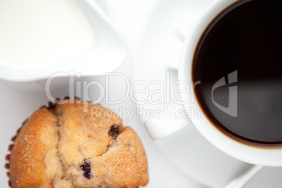 Cup of coffee with muffin
