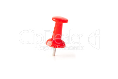 Close up of a red push pin