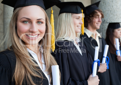 Close-up of a beautiful graduate with blue eyes