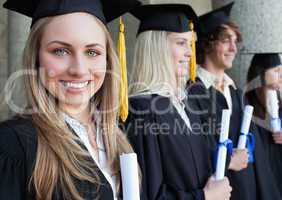 Close-up of a beautiful graduate with blue eyes