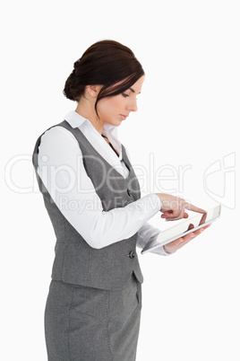 Business woman using a digital computer