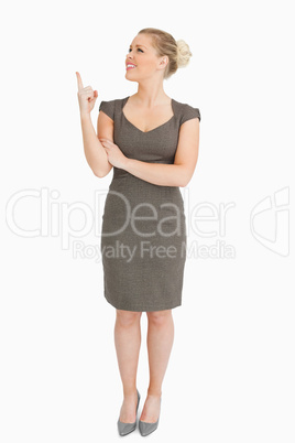 Woman showing something with her finger