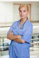 Blonde nurse with arms crossed