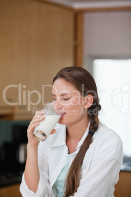 Women drinking a glass of milk