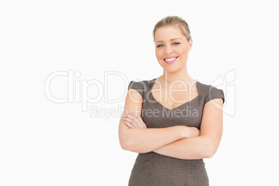 Woman standing with her arms crossed