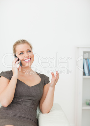 Woman smiling while calling someone
