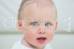 Close up of a baby having blue eyes