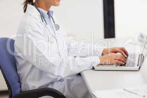 Doctor using a laptop