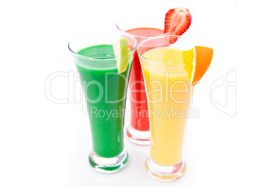 Fruit pieces in three full glasses