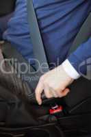 Man fastening his seatbelt