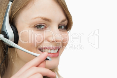 Woman with headset smiling