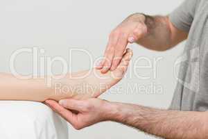 Doctor holding the foot of a patient