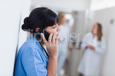 Nurse holding a mobile phone