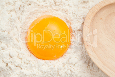 Egg yolk on the flour