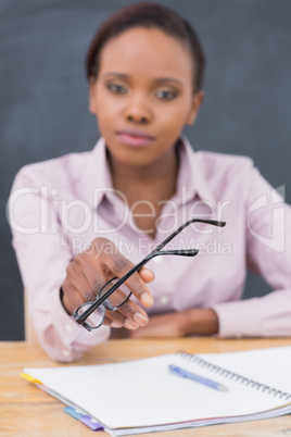 Focus on glasses of a teacher