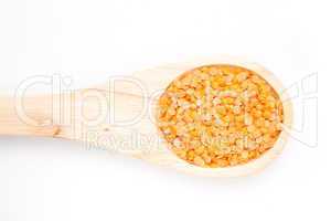 Wooden spoon with lentils