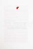 Blank page with red thumbtack