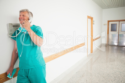 Surgeon holding a phone