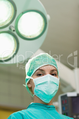 Surgeon under surgical lights