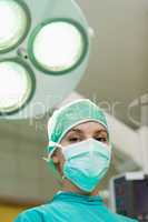 Surgeon under surgical lights