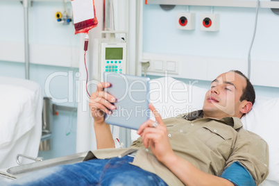 Transfused patient using a tablet computer