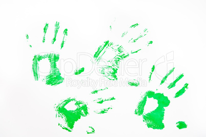 Four green handprints