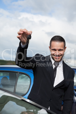 Happy man holding car keys