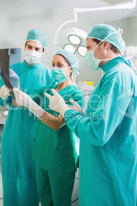 Close up of a surgical team speaking of a X-ray