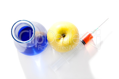 Apple beaker and a syringe