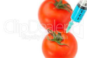 Syringe pricking tomato