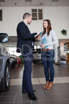 Salesman writing in a file