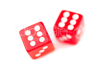 Two red dices in motion
