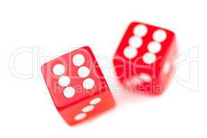 Two red dices in motion