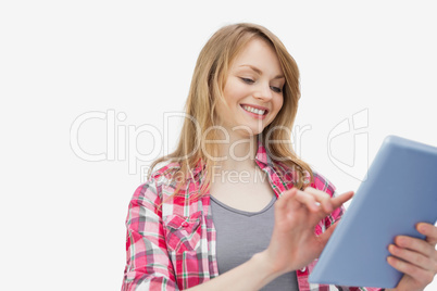 Woman touching a tablet computer