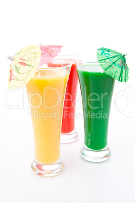Cocktail umbrella in three glasses