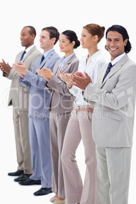 Business team smiling and applauding