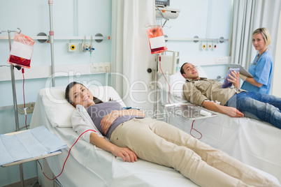 Transfused patient lying on a medical bed
