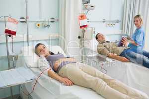 Transfused patient lying on a medical bed