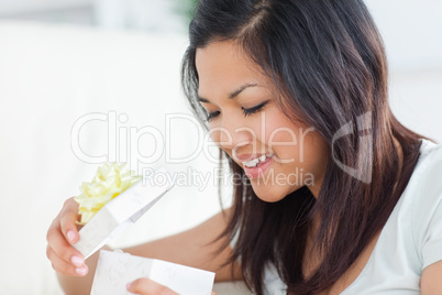 Close-up of a woman looking into an open gift box