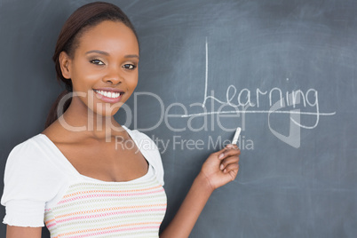 Teacher showing the blackboard