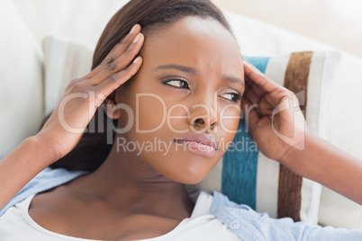 Black woman having pains on the head