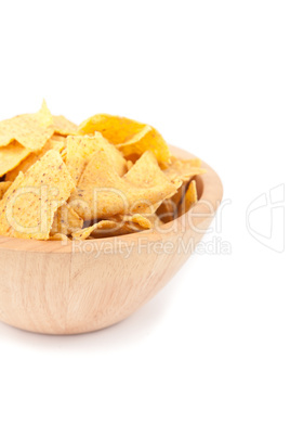 Wooden bowl full of crisps